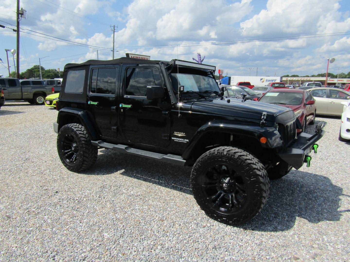 2015 Black /Tan Jeep Wrangler (1C4HJWEG4FL) with an V6 engine, Automatic transmission, located at 15016 S Hwy 231, Midland City, AL, 36350, (334) 983-3001, 31.306210, -85.495277 - Photo#0